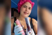 Mãe de três filhos vende geladinhos após muro desabar devido a chuvas