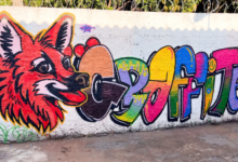 Mural coletivo com lobo-guará marca oficina de grafite em bairro